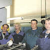Персонал автоматической линии по производству цельнотянутой банки (слева направо): А. Д. Клевов, Ю. А. Таченкова, С. А. Горцуев, А. А. Иванов